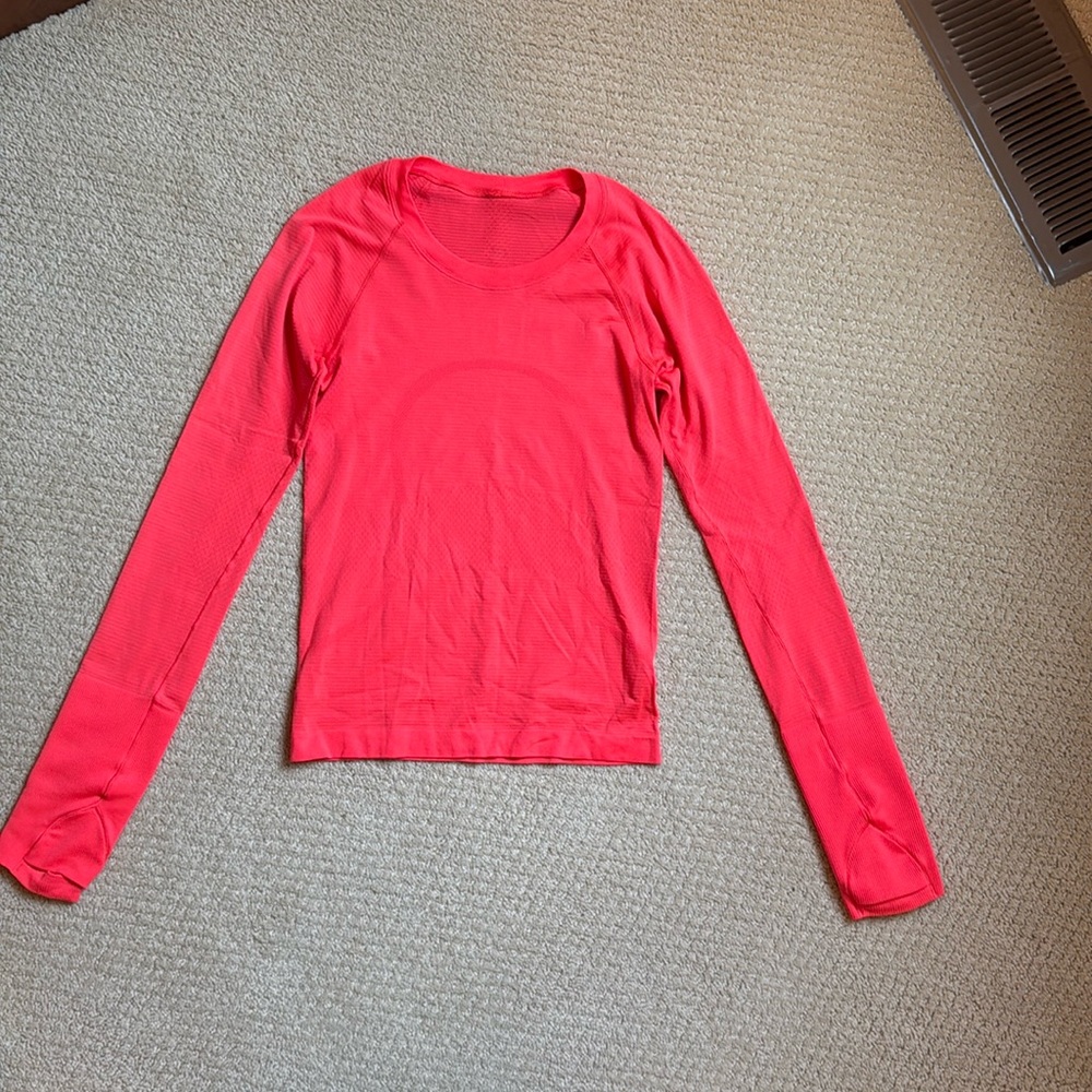 Lululemon Swiftly Tech 2.0. Race length. Size 2. Color: bright orange